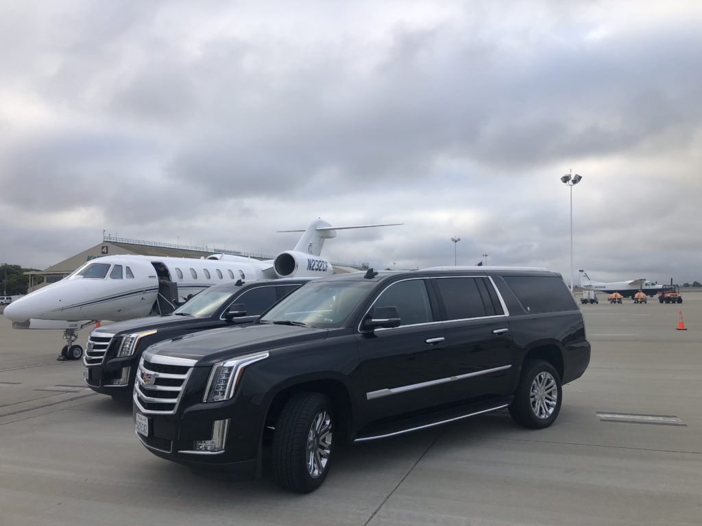 MGL Limo SUV at the airport waiting for a client for business travel in sf