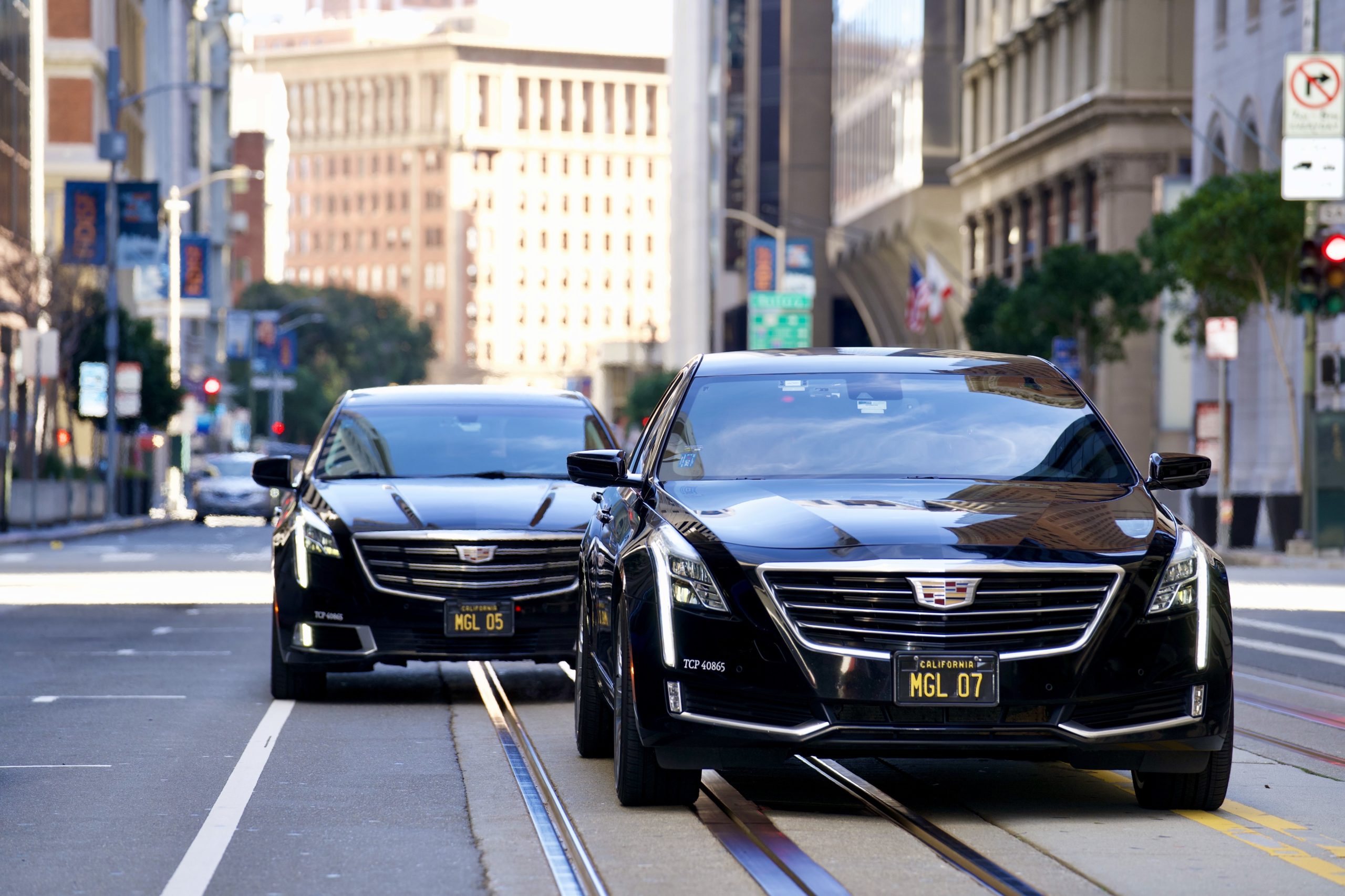 About MGL Limos, two Cadillac sedans driving in SF